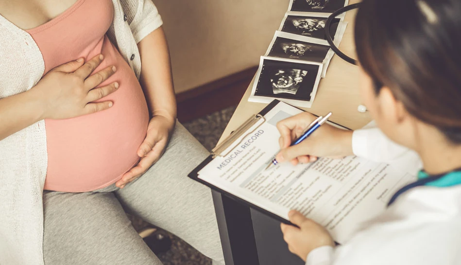 Early pregnancy viability scan ultrasound showing fetal heartbeat